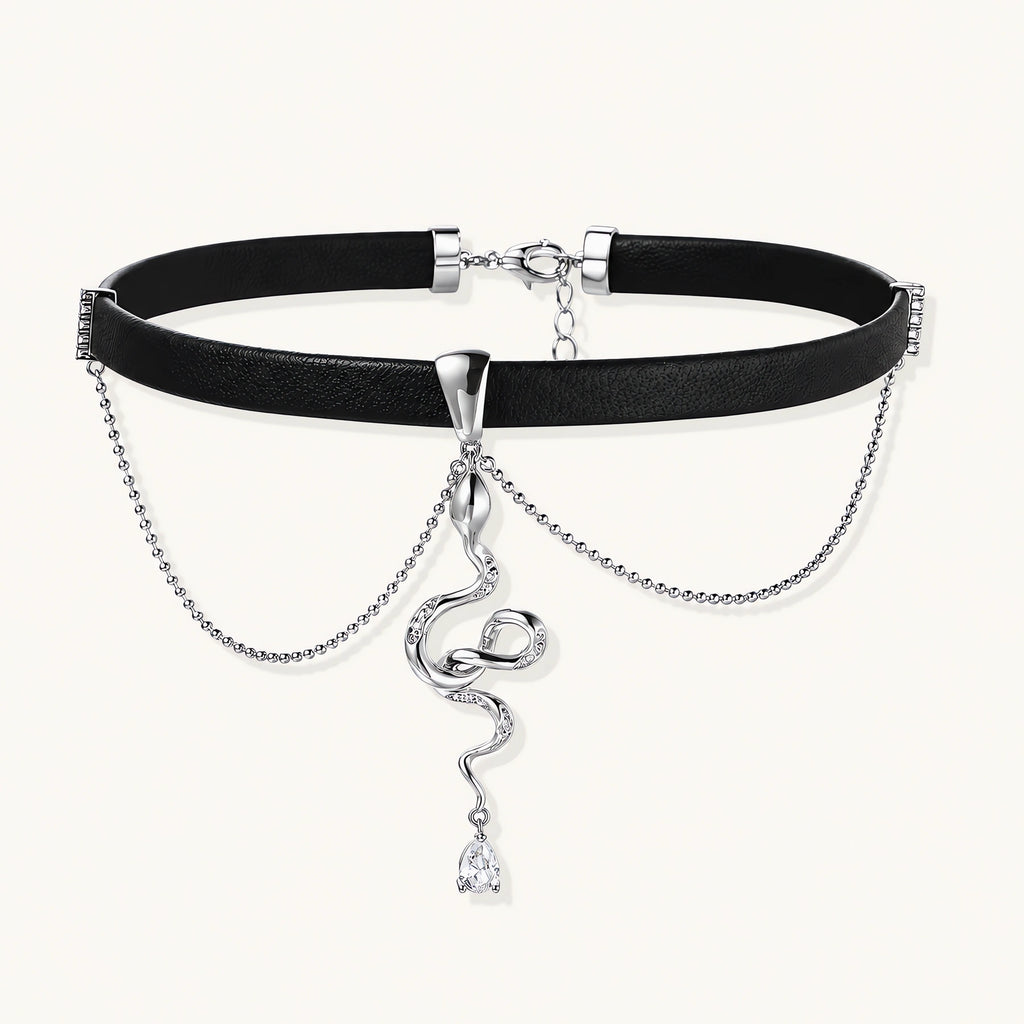 Black leather choker with white gold-plated serpent pendant adorned with zirconia crystals and teardrop charm