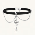 Black leather choker with white gold-plated serpent pendant adorned with zirconia crystals and teardrop charm